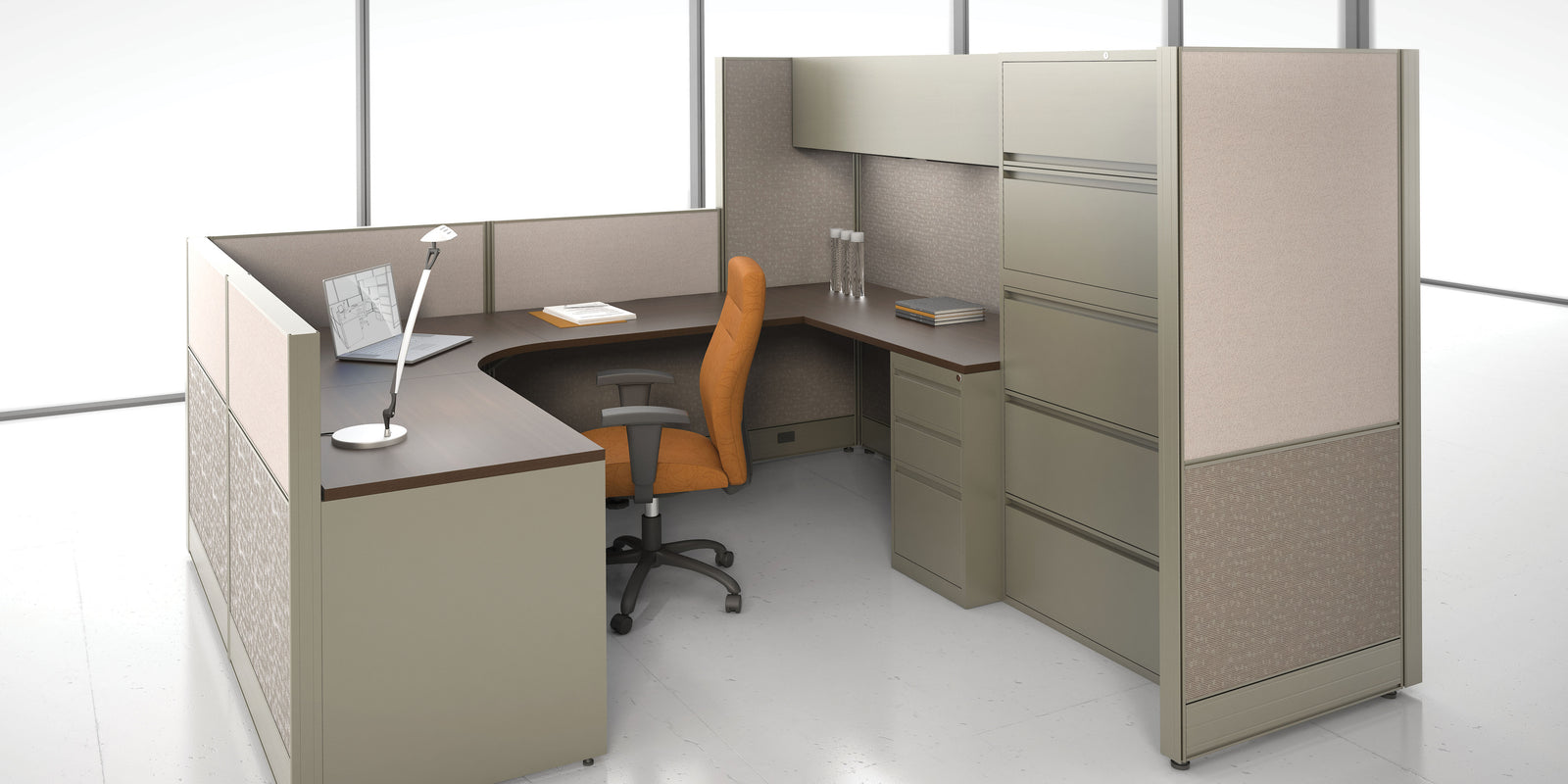 Modern office desk with chair and computer setup in a bright room
