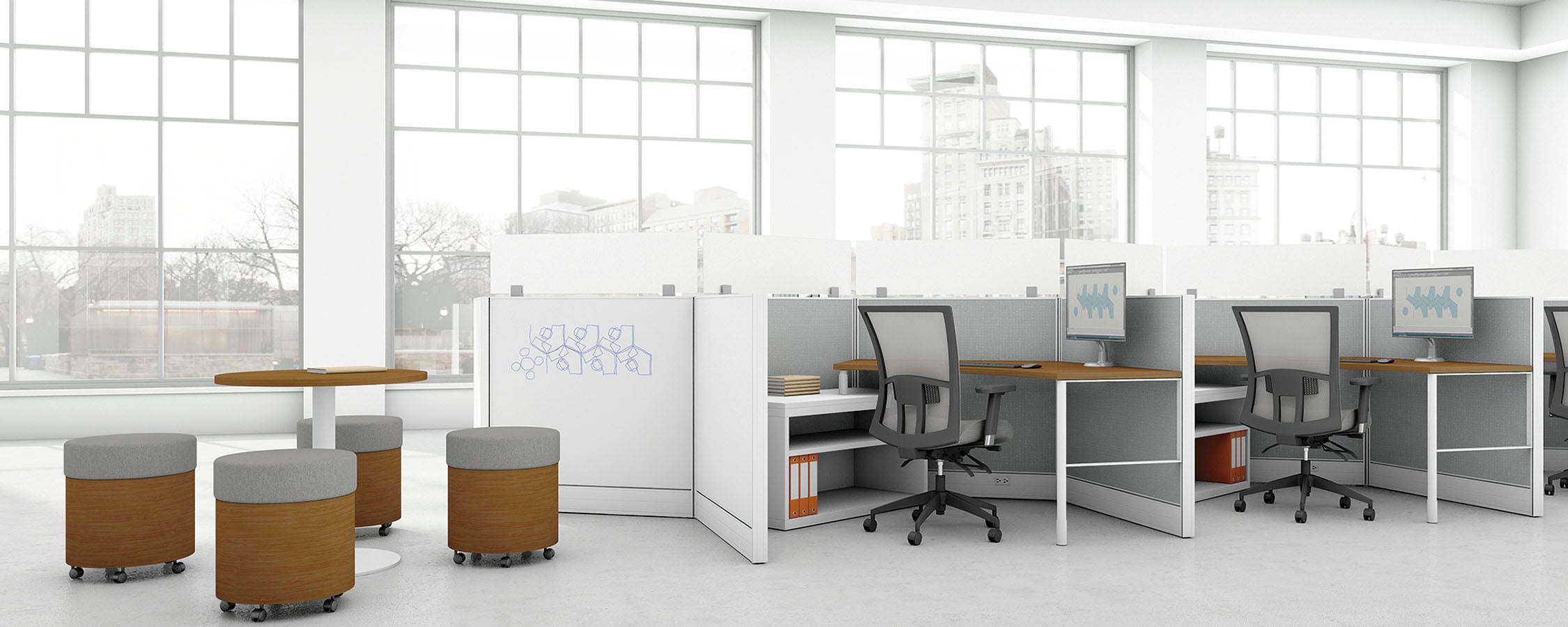Modern office setup with desks, chairs, and a whiteboard in a bright room.